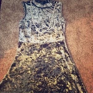 Velvet dress.Along with pearl necklace